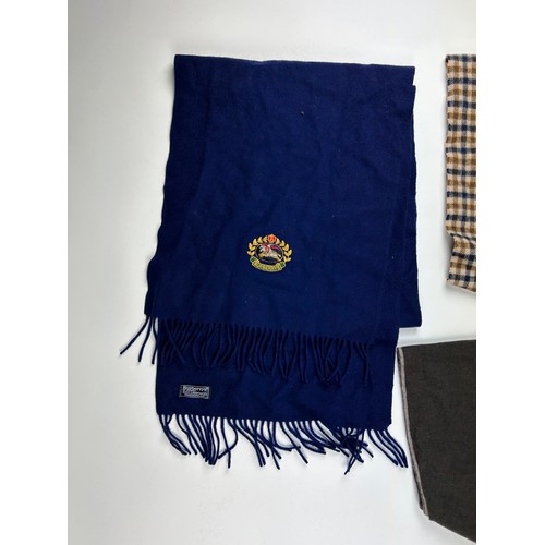 112 - A BURBERRY SCARF ALONG WITH TWO AQUASCUTUM SCARVES, 

The Burberry in navy blue with subtle crested ... 