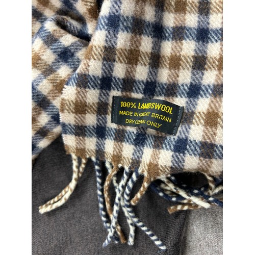 112 - A BURBERRY SCARF ALONG WITH TWO AQUASCUTUM SCARVES, 

The Burberry in navy blue with subtle crested ... 