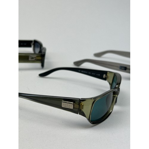 91 - THREE PAIRS OF GUCCI SUNGLASSES (3)