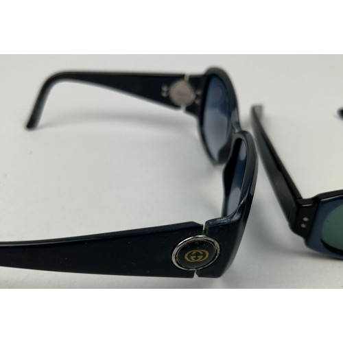 92 - TWO PAIRS OF BLACK AND BLUE GUCCI SUNGLASSES (2)