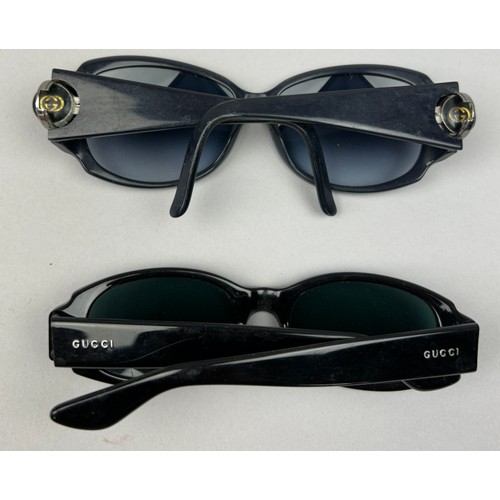 92 - TWO PAIRS OF BLACK AND BLUE GUCCI SUNGLASSES (2)