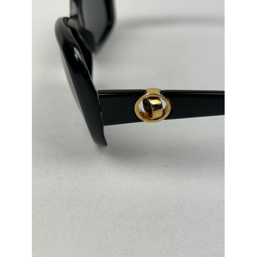 65 - TWO PAIRS OF VINTAGE CHANEL SUNGLASSES, one tortoiseshell the other black, both with interlocking 'C... 