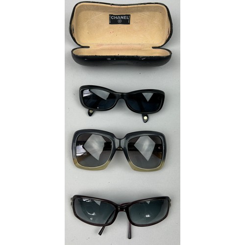 66 - A SET OF THREE CHANEL SUNGLASSES, one with diamanté interlocking 'CC' emblem on frames, another with... 