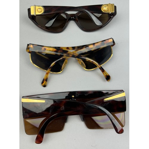 68 - A SET OF THREE GIANNI VERSACE TORTOISESHELL DESIGN SUNGLASSES,

One pair of aviators with thick gold... 