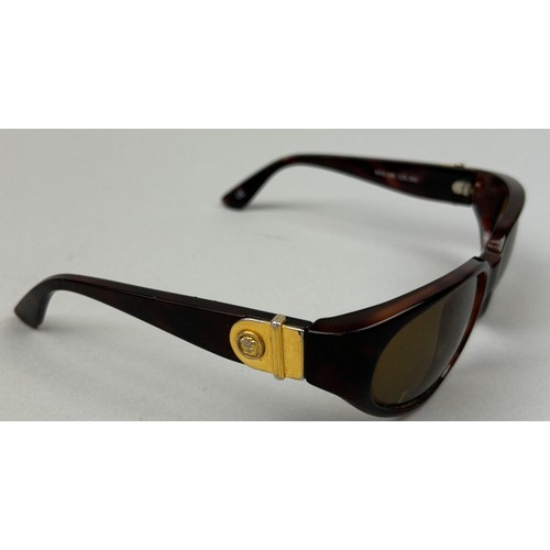 68 - A SET OF THREE GIANNI VERSACE TORTOISESHELL DESIGN SUNGLASSES,

One pair of aviators with thick gold... 