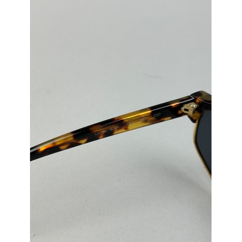 68 - A SET OF THREE GIANNI VERSACE TORTOISESHELL DESIGN SUNGLASSES,

One pair of aviators with thick gold... 