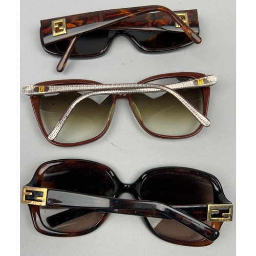 73 - THREE VINTAGE FENDI TORTOISESHELL DESIGN SUNGLASSES, each with interlocking 'FF' emblems on frames.