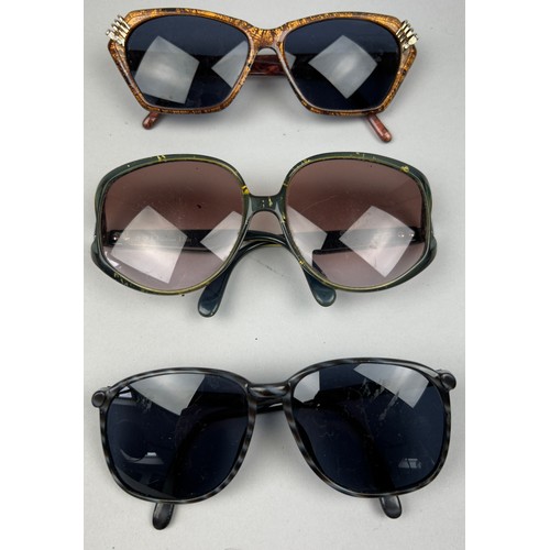 75 - THREE VINTAGE CHRISTIAN DIOR SUNGLASSES, various coloured frames and shades.