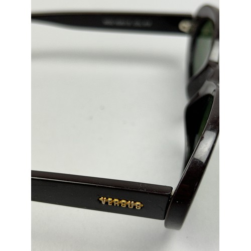 82 - FOUR PAIRS OF VINTAGE VERSACE SUNGLASSES, including one in a case with 'Medusa head' emblem (4)

One... 