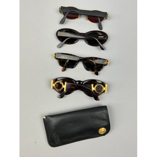 82 - FOUR PAIRS OF VINTAGE VERSACE SUNGLASSES, including one in a case with 'Medusa head' emblem (4)

One... 