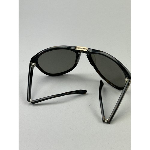 83 - FOUR PAIRS OF SUNGLASSES, brands to include CP company and Belstaff (foldable frames)