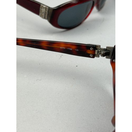 89 - FOUR PAIRS OF DESIGNER SUNGLASSES, to include Gucci and Yves Saint Laurent YSL (4)