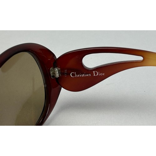 94 - A PAIR OF CHRISTIAN DIOR SUNGLASSES IN RED, with 'CD' monogram to frames