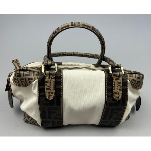 2 - A FENDI HANDBAG IN WHITE WITH BROWN LEATHER DETAILS, 'Zucca print' interlocking 'FF' throughout. Com... 