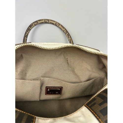 2 - A FENDI HANDBAG IN WHITE WITH BROWN LEATHER DETAILS, 'Zucca print' interlocking 'FF' throughout. Com... 