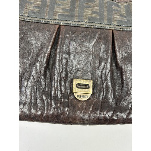 3 - A FENDI BROWN LEATHER HANDBAG, with 'Zucca print' design throughout and gold coloured clasp.

34cm x... 