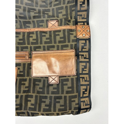 4 - A FENDI SIDE BAG, with tan leather details and 'Zucca print' interlocking 'FF' emblems throughout.

... 