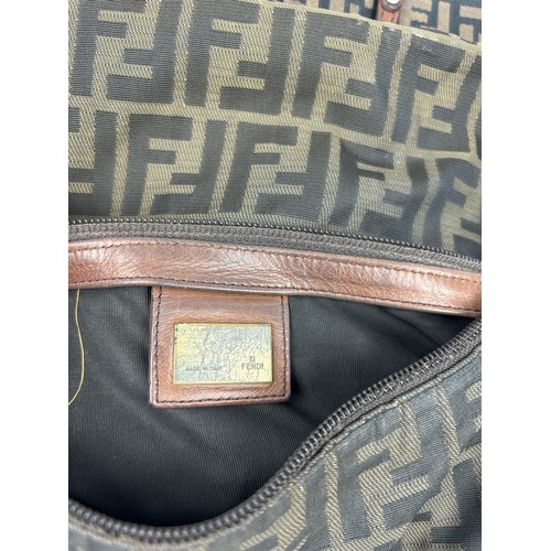 4 - A FENDI SIDE BAG, with tan leather details and 'Zucca print' interlocking 'FF' emblems throughout.

... 