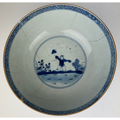 64 - A LARGE 18TH CENTURY CHINESE PORCELAIN BOWL, 

Blue and white painted depicting a boy at play. 

Var... 