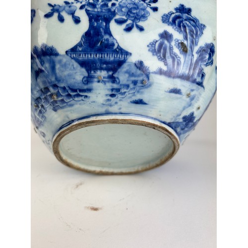 63 - A LARGE CHINESE PORCELAIN 18TH CENTURY BLUE AND WHITE BOWL, 

Painted with imagery of flowers in a v... 