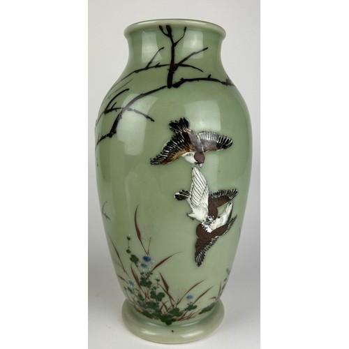 73 - A JAPANESE MEIJI PERIOD (1868-1912) GREEN GLAZED BALUSTER VASE, painted and enamelled with swallows ... 