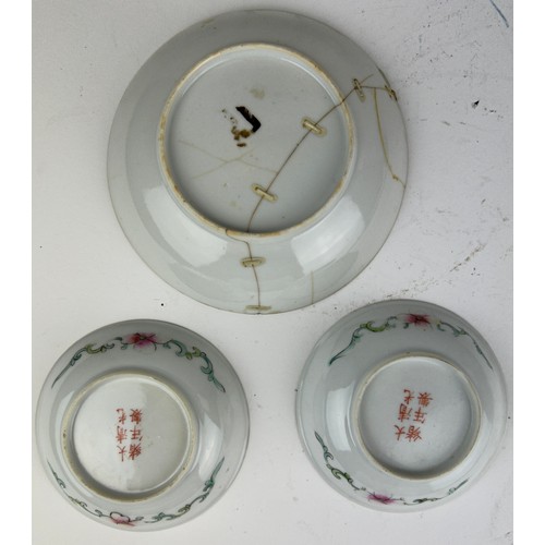 67 - A COLLECTION OF THREE CHINESE PLATES, two millefleurs famille rose with six character marks to verso... 