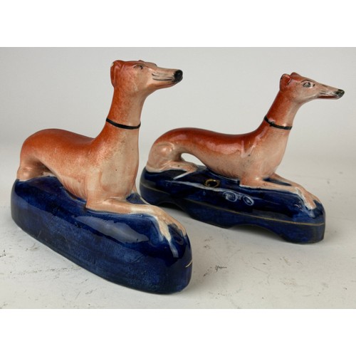 88 - A PAIR OF STAFFORDSHIRE GREYHOUND INKWELLS (2)

18cm in length

**Please note this lot will be avail... 