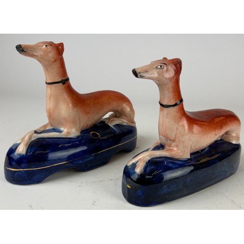 88 - A PAIR OF STAFFORDSHIRE GREYHOUND INKWELLS (2)

18cm in length

**Please note this lot will be avail... 