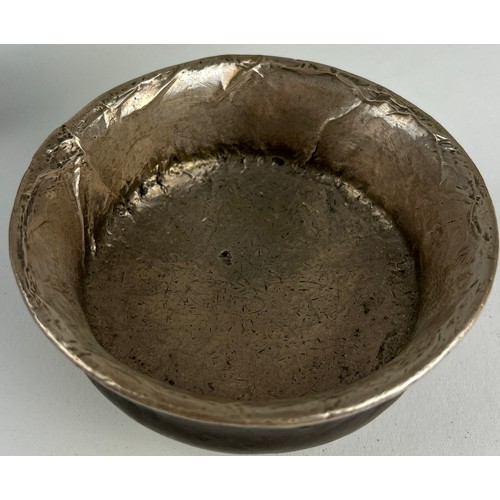 135 - A TIBETAN SILVER AND BURL WOOD CEREMONIAL CUP, 

19th Century, thinly beaten silver applied to the d... 