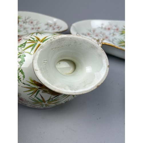 84 - A WEDGWOOD SHELL DESIGN PART DINNER SERVICE IN THE JAPANESE STYLE, painted with flowers and rocky ou... 