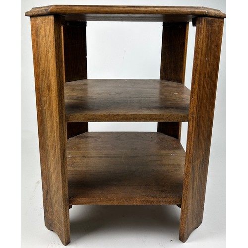 216 - AN ART DECO OAK OCTAGONAL THREE TIER BOOKCASE IN THE MANNER OF HEALS, 

60cm in height x 44cm in wid... 