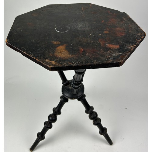 225 - A VICTORIAN EBONISED SIDE TABLE WITH UNUSUAL TRIPOD SUPPORTS AND BASE

65cm in height x 45cm in widt... 