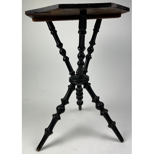 225 - A VICTORIAN EBONISED SIDE TABLE WITH UNUSUAL TRIPOD SUPPORTS AND BASE

65cm in height x 45cm in widt... 