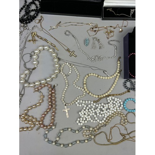 285 - A QUANTITY OF EARRINGS AND BEADED NECKLACES, to include earrings by Givenchy, some 925 silver exampl... 