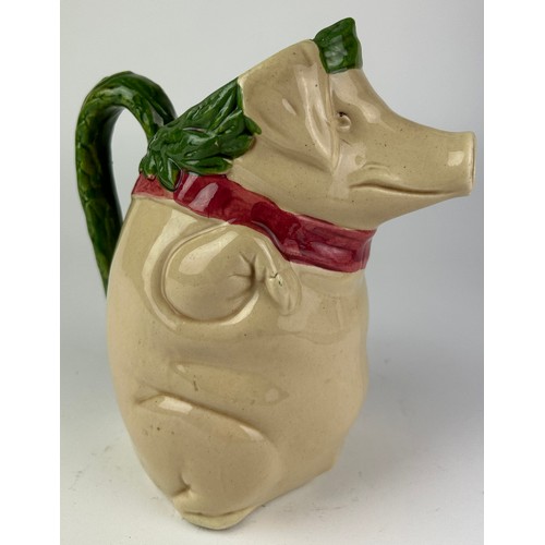 90 - A MAJOLICA PIG JUG, depicting a pig holding a ham

22cm in height

**Please note this lot will be av... 