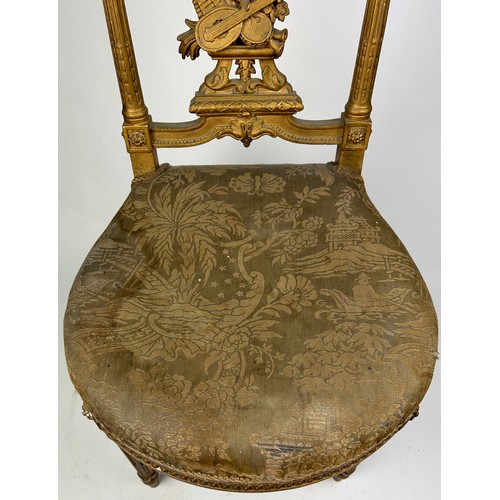 227 - A LOUIS XVI STYLE GILTWOOD SIDE CHAIR, with silk chinoiserie upholstered seat. 

Pierced back rail w... 