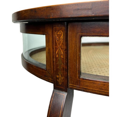 222 - AN EDWARDIAN MAHOGANY BIJOUTERIE TABLE OF OVAL FORM, with satinwood scroll inlay decoration, raised ... 