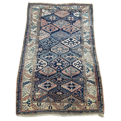 248 - AN ANTIQUE PERSIAN KILIM RUG, 

Faded and worn.

205cm x 130cm

**Please note this lot will be avail... 