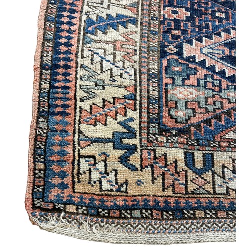 248 - AN ANTIQUE PERSIAN KILIM RUG, 

Faded and worn.

205cm x 130cm

**Please note this lot will be avail... 