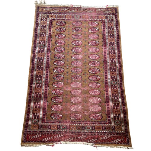 250 - A PERSIAN RUG, 

Faded and damaged

**Please note this lot will be available for collection at an of... 