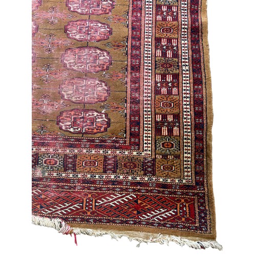 250 - A PERSIAN RUG, 

Faded and damaged

**Please note this lot will be available for collection at an of... 