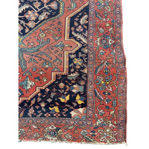 251 - AN ANTIQUE PERSIAN RUG, floral design

186cm x 136cm

**Please note this lot will be available for c... 