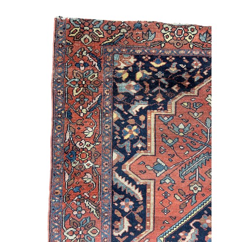 251 - AN ANTIQUE PERSIAN RUG, floral design

186cm x 136cm

**Please note this lot will be available for c... 