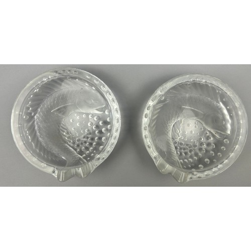 118 - A PAIR OF LALIQUE CRYSTAL 'CONCARNEAU' ASHTRAYS, DEPICTING SWIRLING FISH WITH BUBBLES, both signed t... 