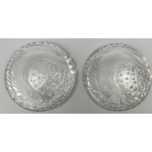 118 - A PAIR OF LALIQUE CRYSTAL 'CONCARNEAU' ASHTRAYS, DEPICTING SWIRLING FISH WITH BUBBLES, both signed t... 