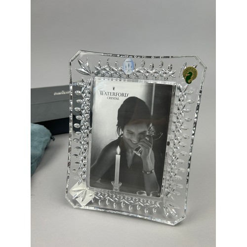 282 - A WATERFORD CRYSTAL PICTURE FRAME, in original packaging and box with receipt