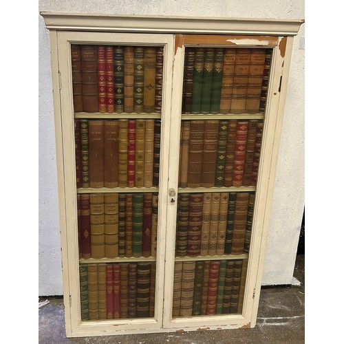 228 - A LARGE VICTORIAN BOOKCASE WITH FAUX BOOK DESIGN INTERIOR, white painted

122cm x 82cm

**Please not... 