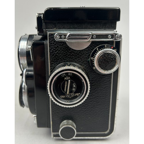 254 - ROLLEIFLEX 2.8 E Camera in original case with neck strap and lens hood (full working order) along wi... 