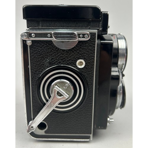 254 - ROLLEIFLEX 2.8 E Camera in original case with neck strap and lens hood (full working order) along wi... 