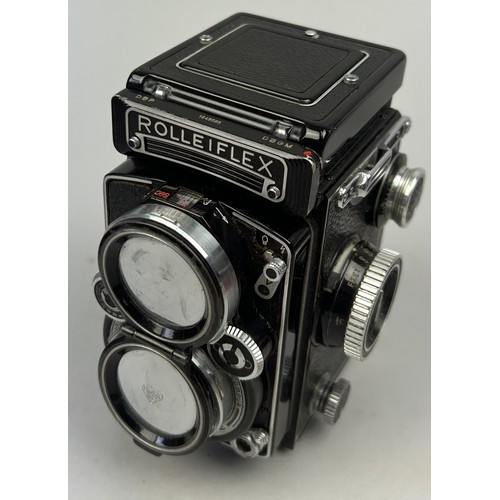 254 - ROLLEIFLEX 2.8 E Camera in original case with neck strap and lens hood (full working order) along wi... 